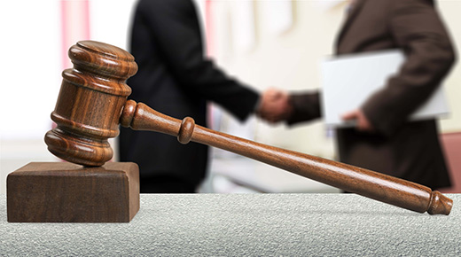 Two attorneys shaking hands